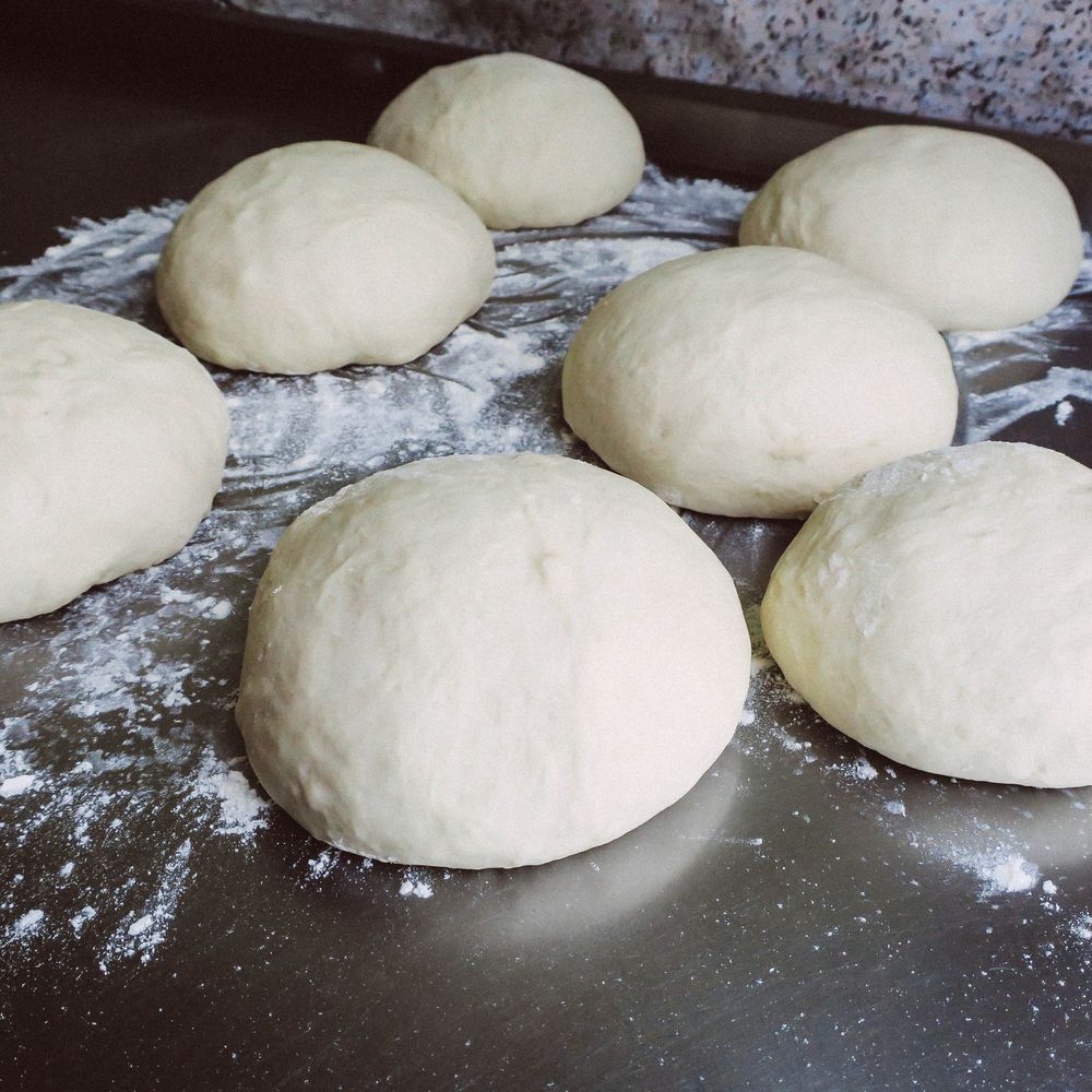 Photo d’illustration : pâte et pain en cuisson